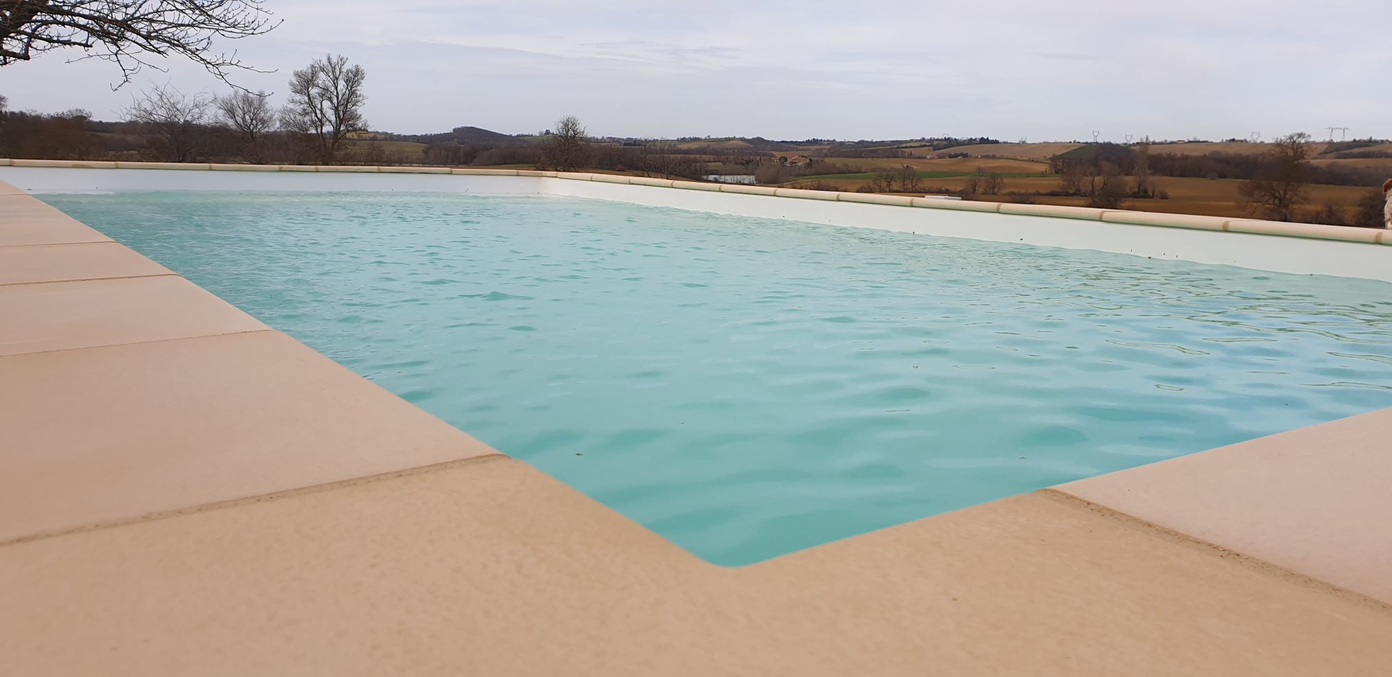 Hydrazur Piscines coulage terrasse plage béton pose margelle pierre reconstituée piscine coque polyester à Portet sur Garonne 31120 Haute Garonne Toulouse